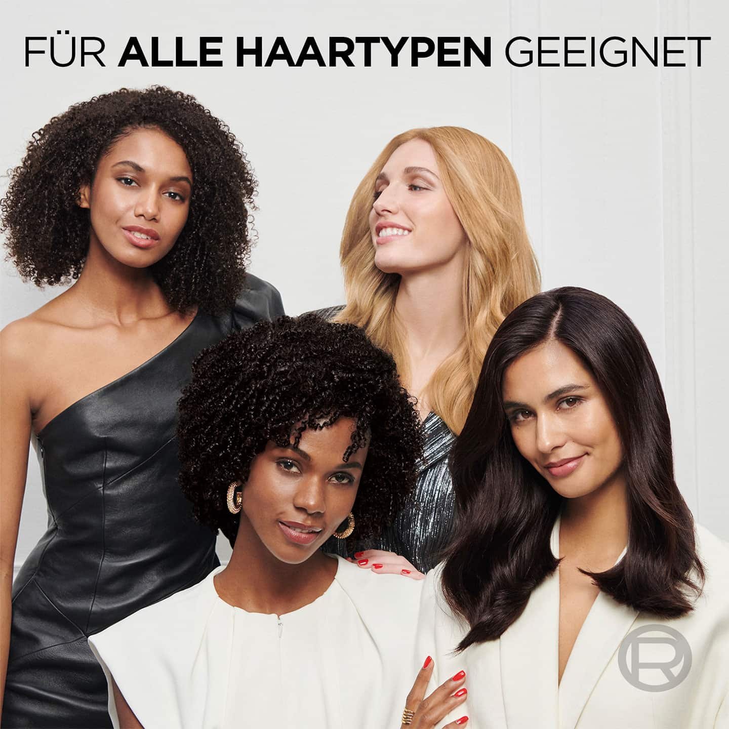 Vier Frauen posieren für die Kamera, alle haben unterschiedliche Haarfarben und Haarstrukturen